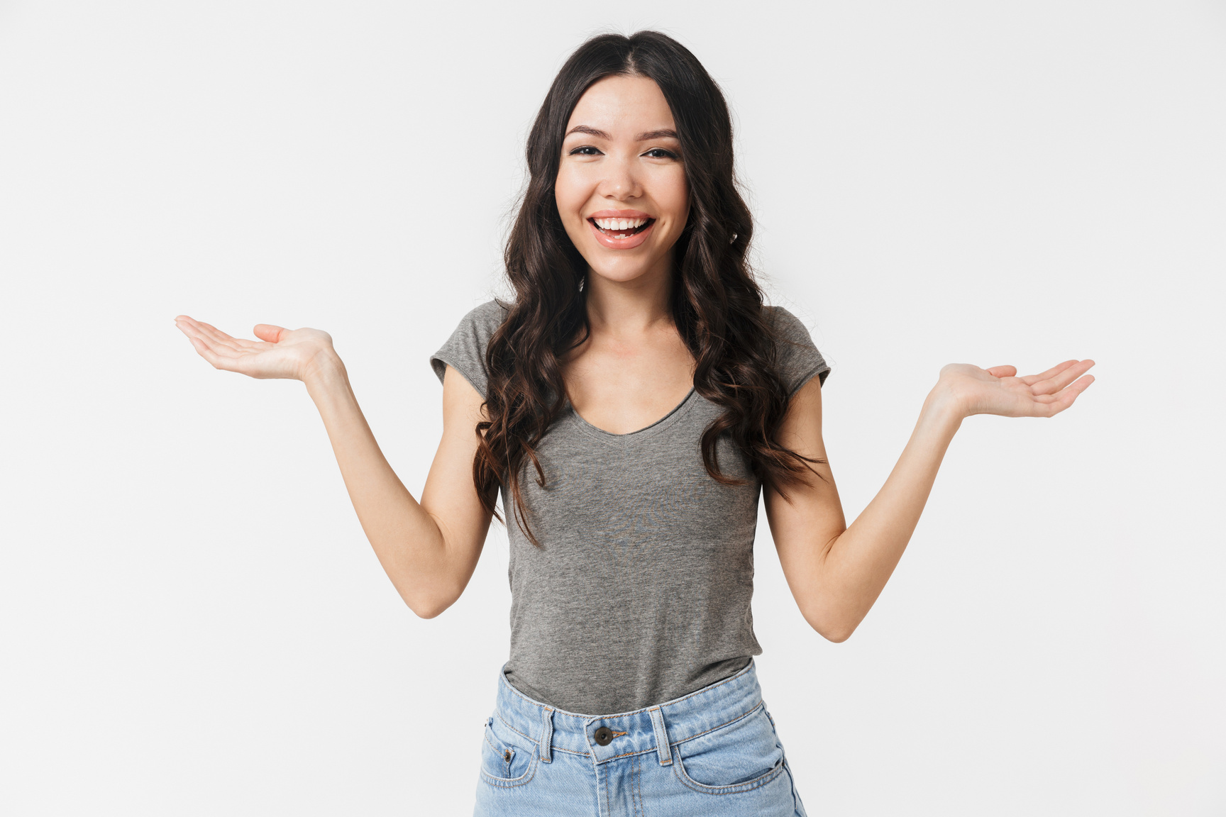 Image of Pleased Brunette Woman 20S Dressed in Basic Clothes Smi